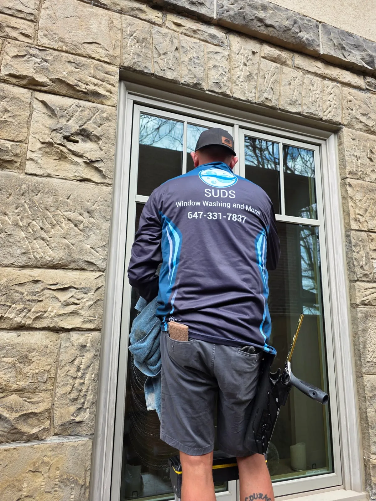 Professional window cleaner from SUDS Windows