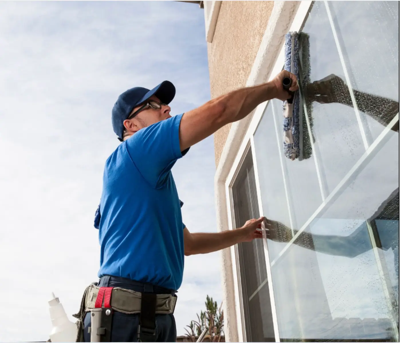 Professional window cleaner providing window cleaning in Toronto for residential exterior glass