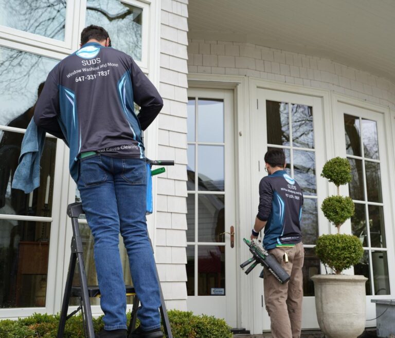 SUDS window cleaning technicians working at a residential property in Toronto.